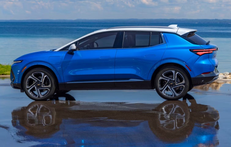 Side view of a Blue SUV